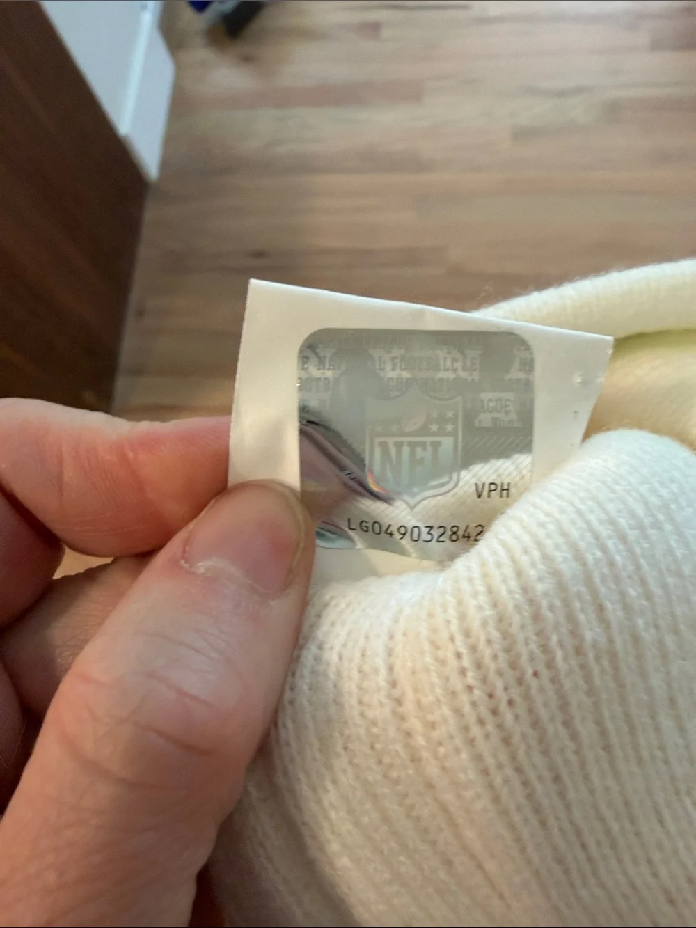 NFL White Knit Beanie with Silver NFL Hologram Tag